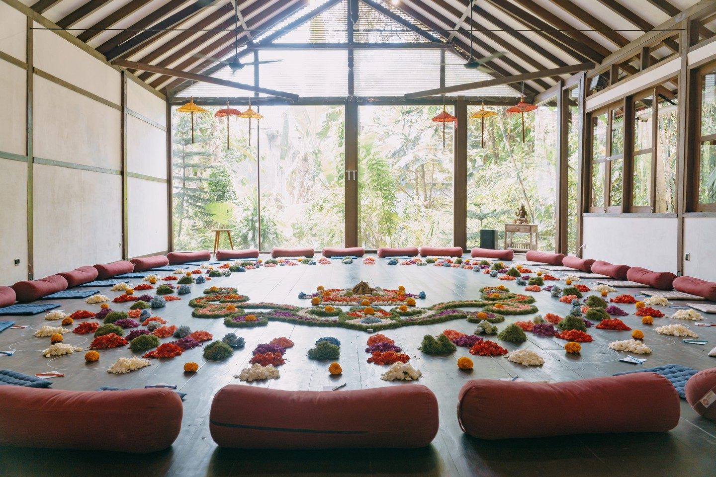 A retreat space set with a large flower mandala